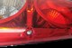 LAMPA TYŁ PRZYCZEPA CARALUNA II PLUS LEWA HELLA