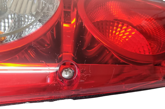 LAMPA TYŁ PRZYCZEPA CARALUNA II PLUS LEWA HELLA